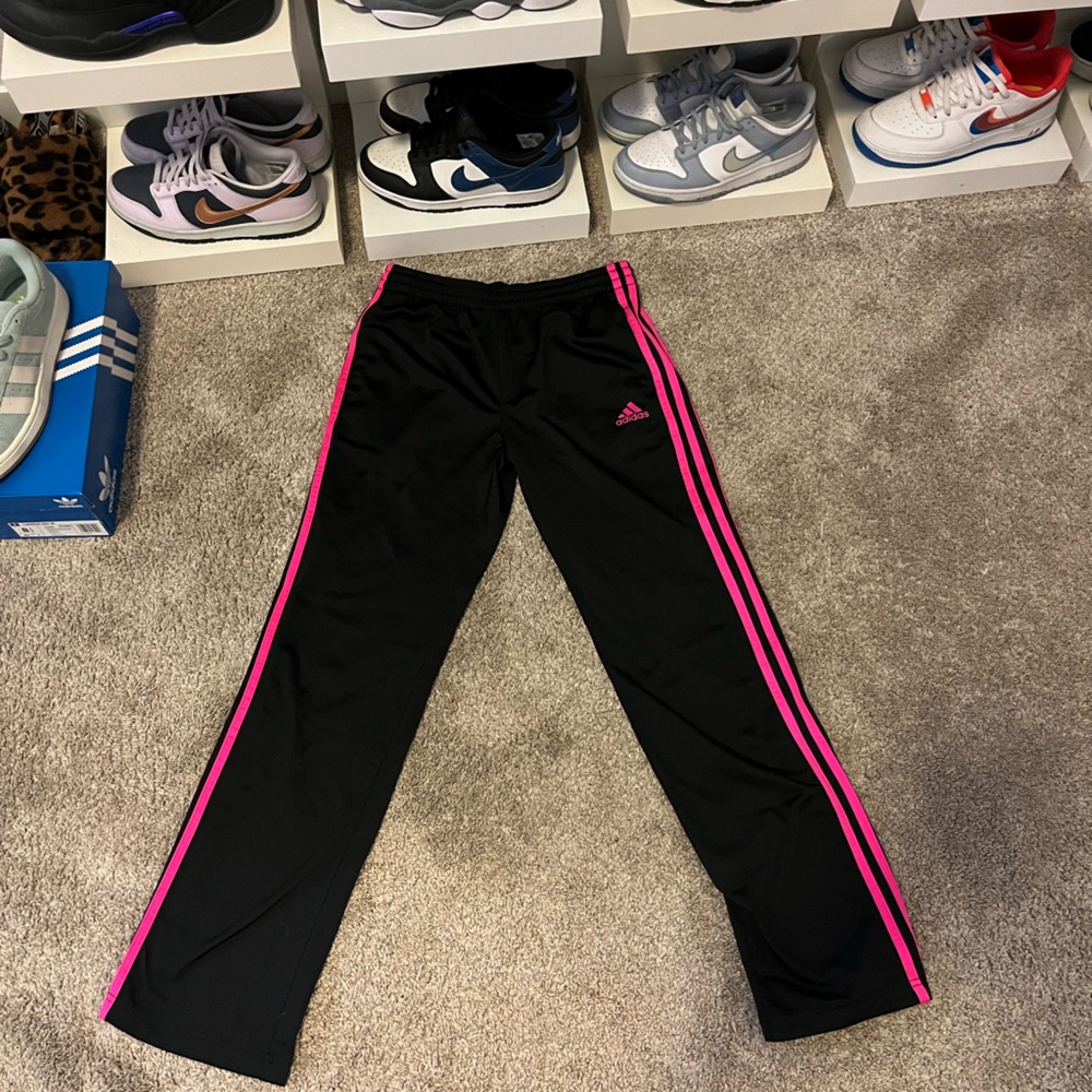 Black adidas pants with pink strips and details